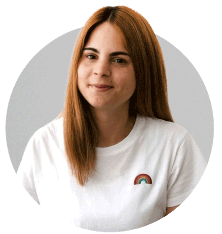 Portrait of Nadja Hodžić, smiling, with orange hair and brown eyes